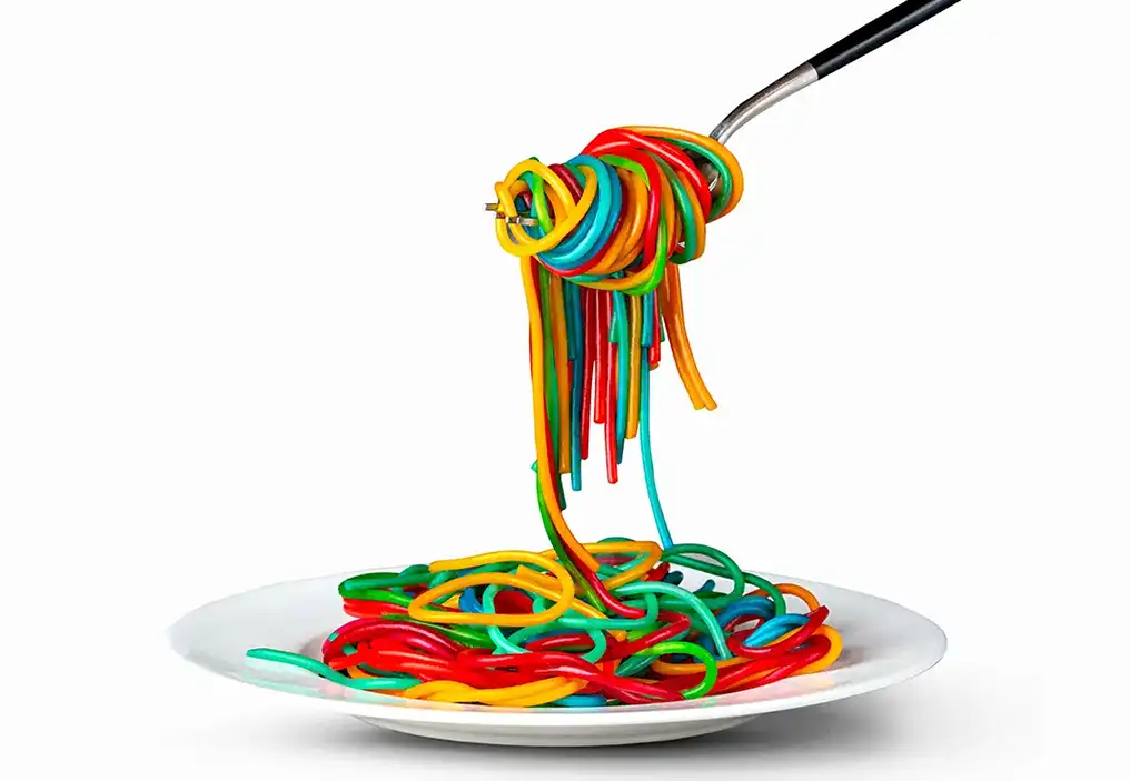 A 3D illustration of a plate of multicoloured ‘spaghetti’ that looks like the plastic insulation for wires. The strands are wound around a fork that is raised in the air.